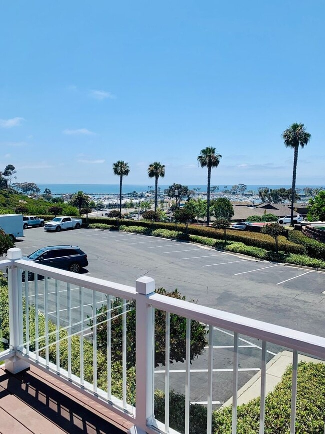 Building Photo - Perched above the stunning Dana Point Harbor, this gorgeous two-story condo offers breathtaking h...