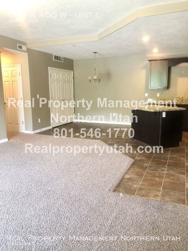 Building Photo - Charming condo- now available!