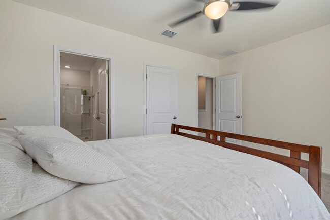 Master bedroom with 2 walk-in closets and full bathroom - 8995 Milestone Dr