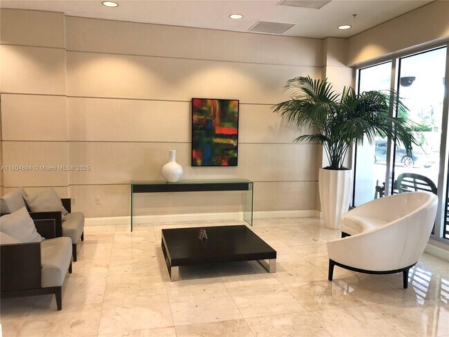 Building Photo - 19380 Collins Ave