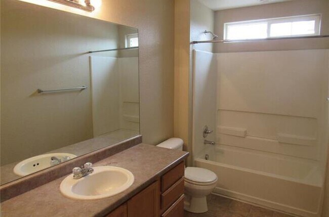 Second full bath upper level. - 7334 Pearly Heath Rd