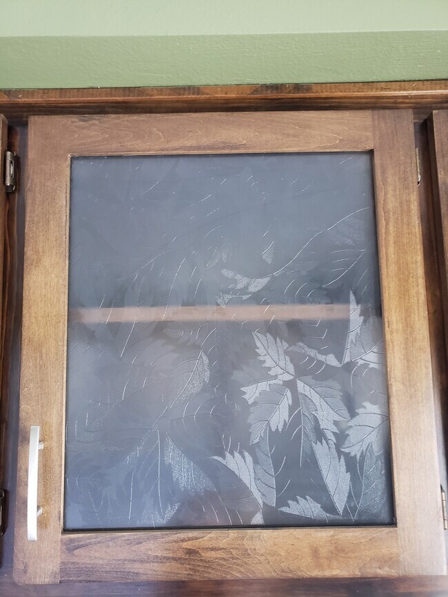 Glass cabinet detail - 5850 Bowcroft St