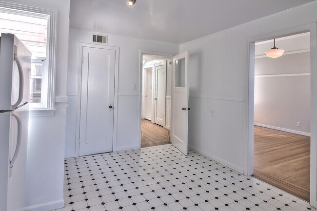 Building Photo - Charming Light-Filled Unit with Private De...
