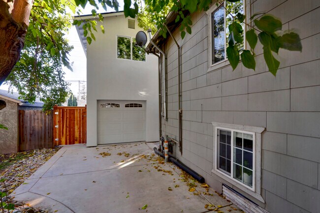 new build is down the long driveway - 5206 Q St