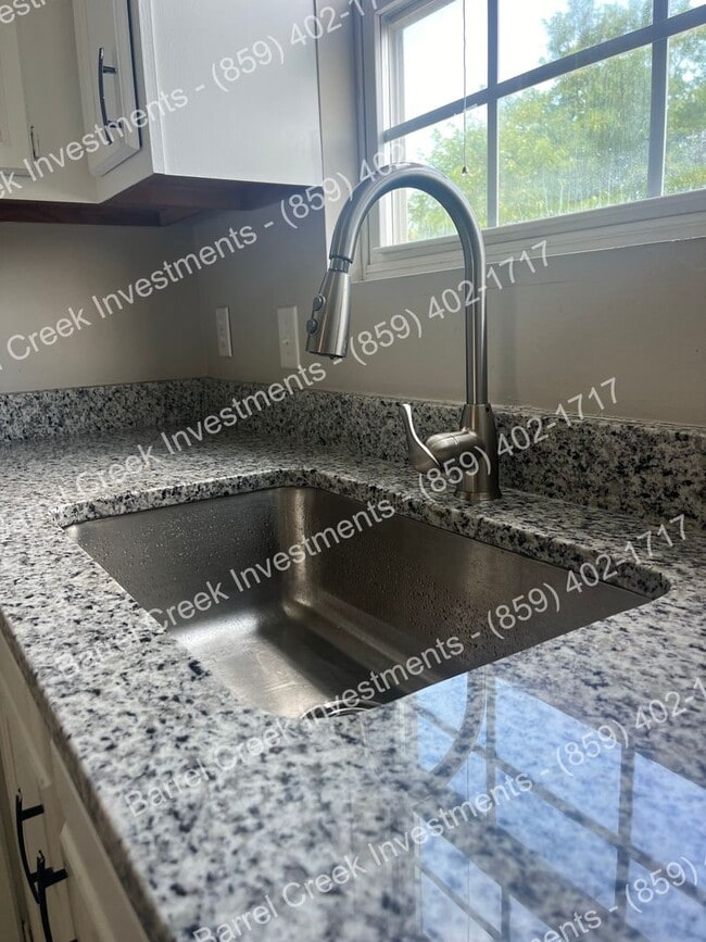 Building Photo - Newly renovated, three-story townhome!