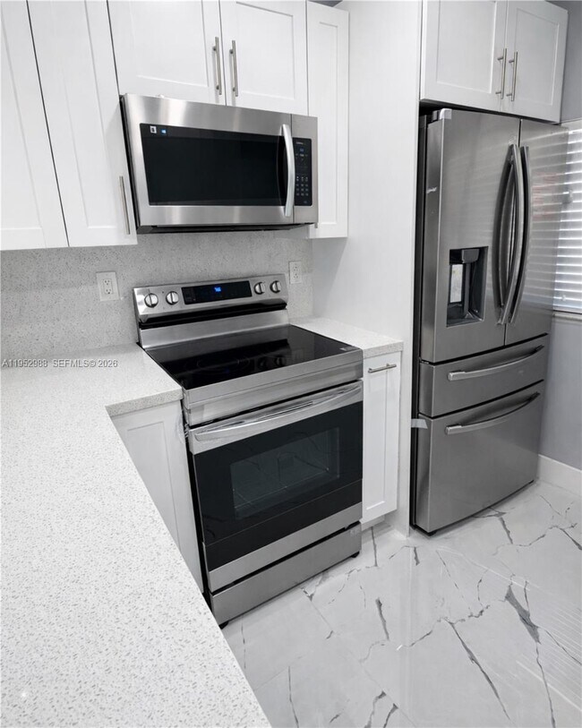 Photo - 7925 W 29th Way Apartment