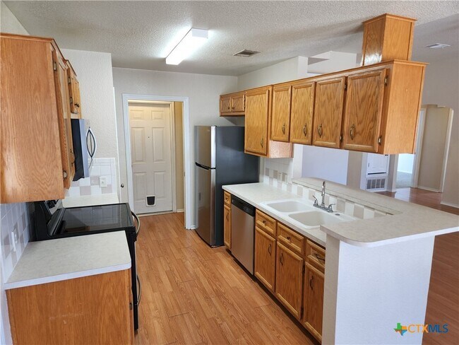 Foto del edificio - 3407 Woodrow Dr
