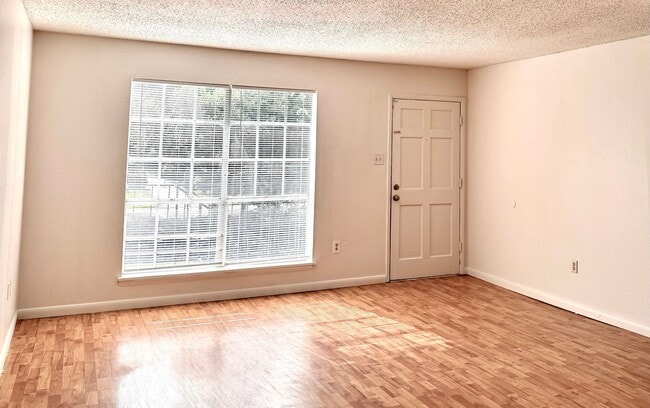 Building Photo - 2 Bed, 1.5 Bath Condo with Pool & Carport ...