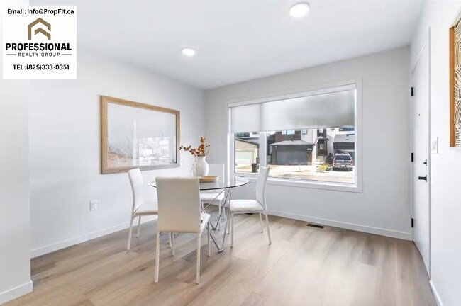 Photo du bâtiment - 7462 Klapstein Cres SW