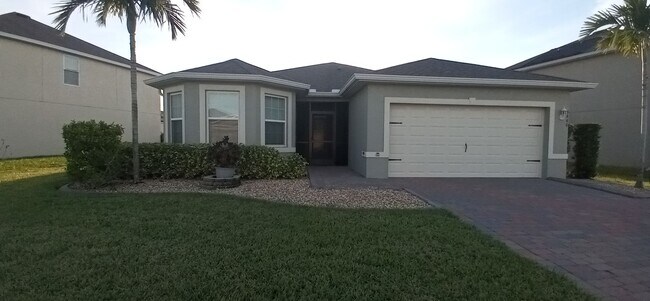 Building Photo - Coming Soon: Charming and Cozy 3 bedroom / 2 bathroom Home with 2 Car Garage, Lake View in Gated ...
