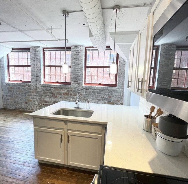 Beautiful Exposed Brick - The Bingham Apartment Homes