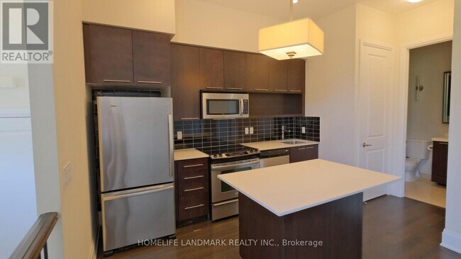Building Photo - 100 Harrison Garden Blvd