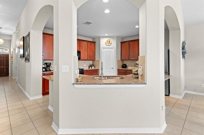 Building Photo - 8017 Bassano Dr