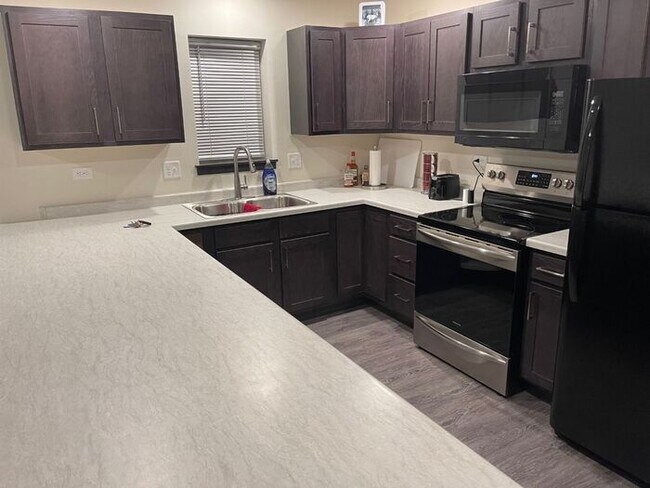 Building Photo - $1100 | 2 Bedroom, 2 Bathroom New Construc...