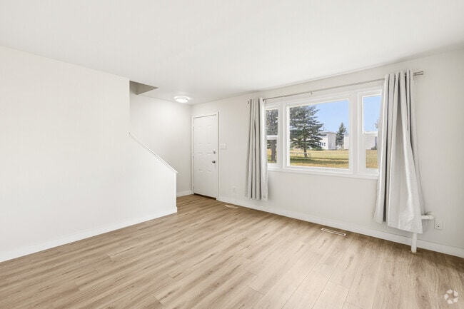 2BD, 1BA - 904SF - Living Room - Trevella Townhomes
