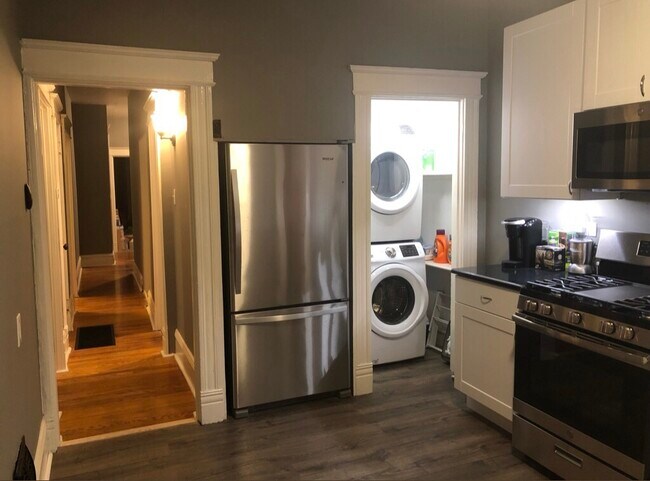 Kitchen + full-sized stackable W/D - 3835 Wyoming St