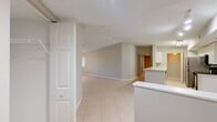 This well-designed apartment offers a blend of comfort and functionality across its 1320 square feet. The layout comprises four bedrooms, including a spacious 160 square foot primary bedroom, providing ample space for rest and relaxation. Two full bathrooms cater to the needs of residents and guests alike.

The heart of the home is a modern kitchen, equipped with white cabinetry, stainless steel appliances, and a convenient breakfast bar. Adjacent to the kitchen is a dedicated laundry area, enhancing the apartment's practicality.

Throughout the space, neutral tones dominate, creating a bright and airy ambiance. Large windows in the bedrooms allow natural light to flood in, while ceiling fans ensure comfortable air circulation. The flooring varies between plush carpeting in the bedrooms and sleek tile in the common areas and bathrooms.

Storage is abundant, with three closets strategically placed throughout the apartment. The bathrooms feature clean lines, with one showcasing a combination tub-shower unit and ample vanity space.

Located in Greenacres, Florida, this apartment offers a comfortable living experience with its thoughtful design and modern amenities.