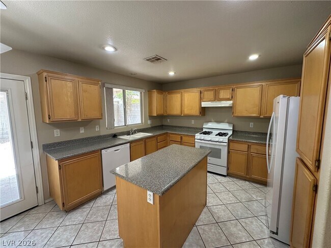 Foto del edificio - 9925 Ranch Hand Ave