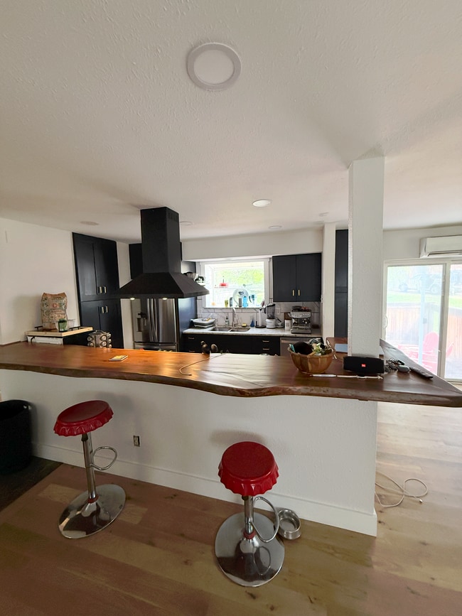 kitchen view from bar - 4626 MacArthur Ln Townhome