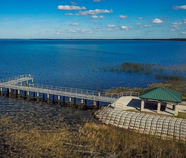 The fishing pier at Lakefront Park stretches over East Lake Toho
