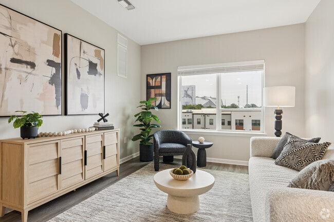 2BR, 1BA - 858SF - Living Room - Legacy at Herndon Square