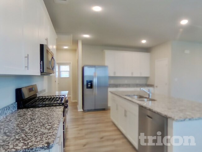 Foto del edificio - 5116 Saddle Clb Dr