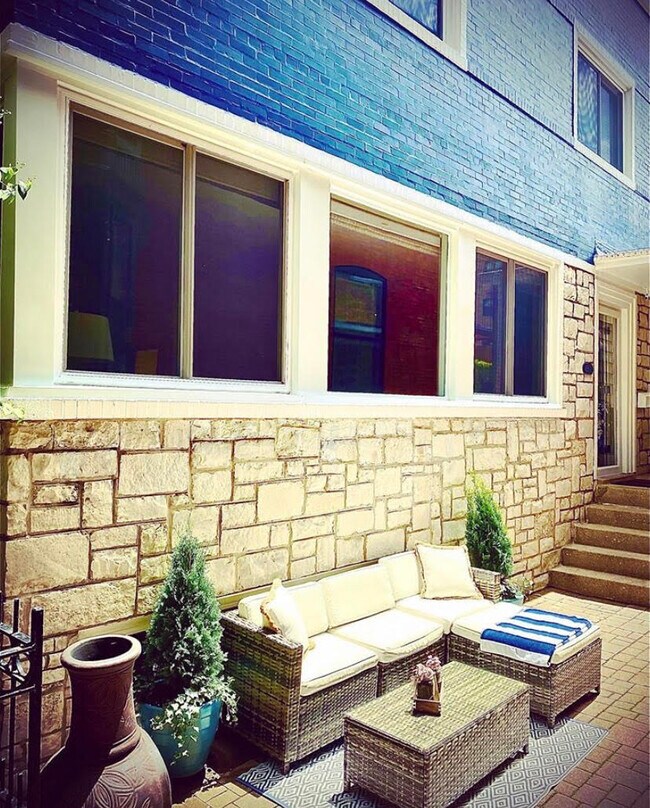 Painted outdoor space with patio! - 433 W Roscoe St