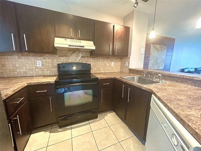 Building Photo - 8750 N Sherman Cir