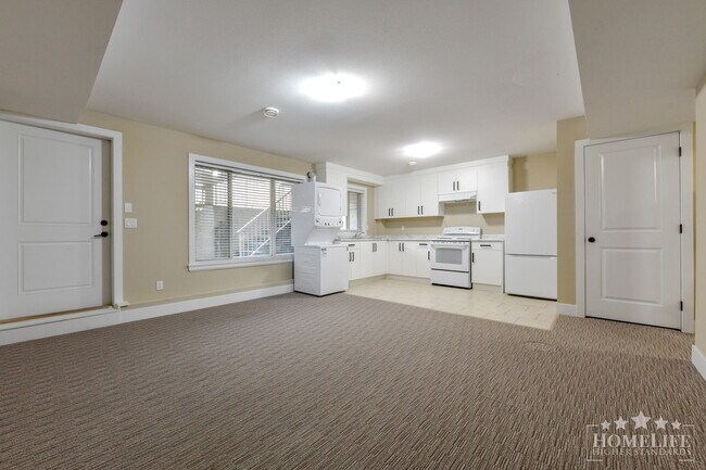 Photo du bâtiment - Bright & Spacious 2 Bed / 1 Bath Basement Suite in Clayton Heights – Perfect for Small Families