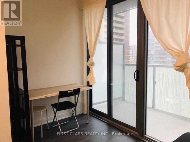 Building Photo - 50 Charles St E