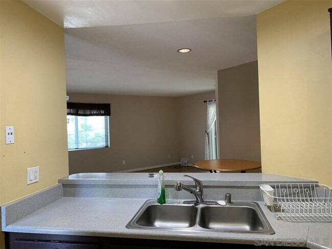 Building Photo - 7597 Charmant Dr