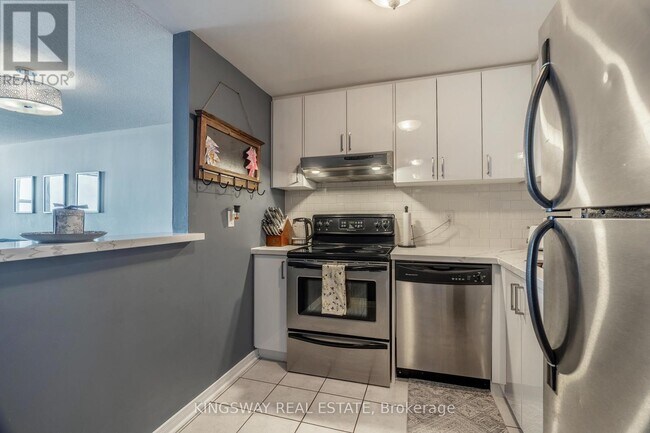 Photo du bâtiment - 6720 Glen Erin Dr