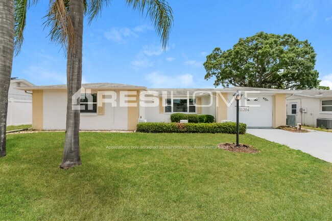 Building Photo - 11204 Tamarix Ave