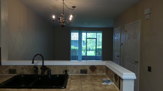 Building Photo - Cute 2/2.5 Two-Story Townhouse in Gated Du...