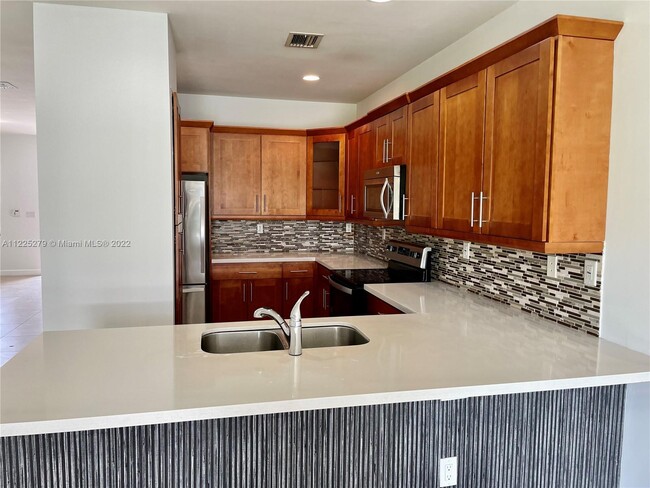 Building Photo - 5980 NW 104th Ct