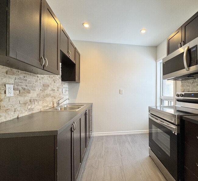 Photo du bâtiment - 97 Garfield Ave S