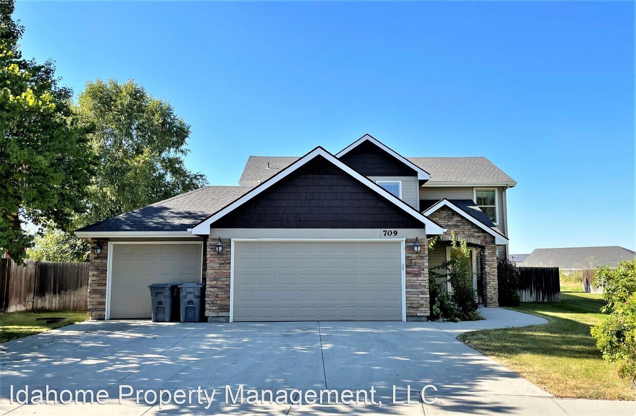 Primary Photo - 4 br, 2.5 bath House - 709 N Saddlebrook Way