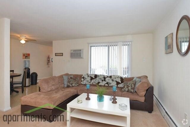 Sala de estar - Belmont Village Apartments