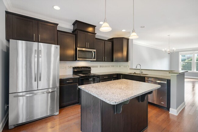 Photo - Available NOW! 4 Bedroom, 4 Bath Townhouse Located in Cary Park!