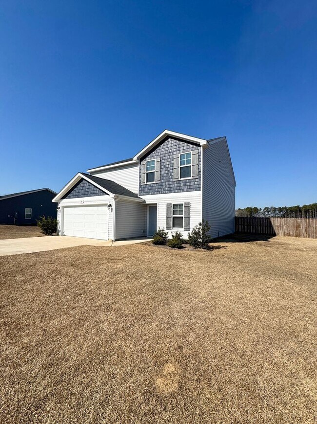 Foto del edificio - Spacious 4 Bed 2.5 Bath Home with Flex Rooms