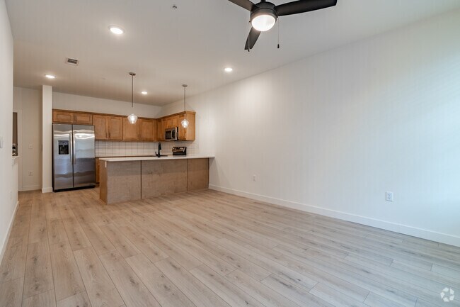 A3 1 habitación, 1 baño - 879 pies cuadrados - Sala de estar - Grays Creek Apartments