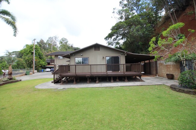 Foto del edificio - 4-bedroom Home with Huge Covered lanai and...