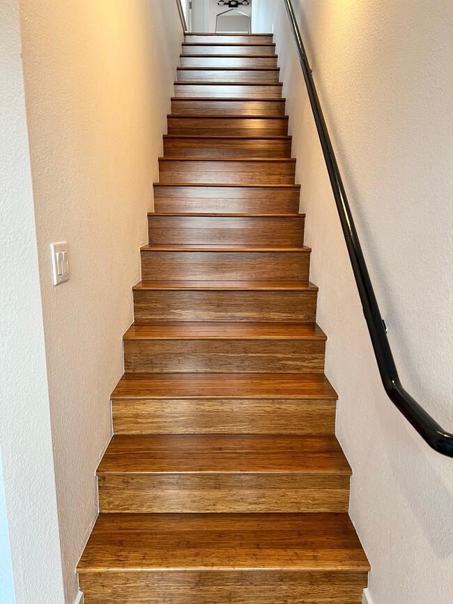 Stairs to second floor - 605 Palisade Dr