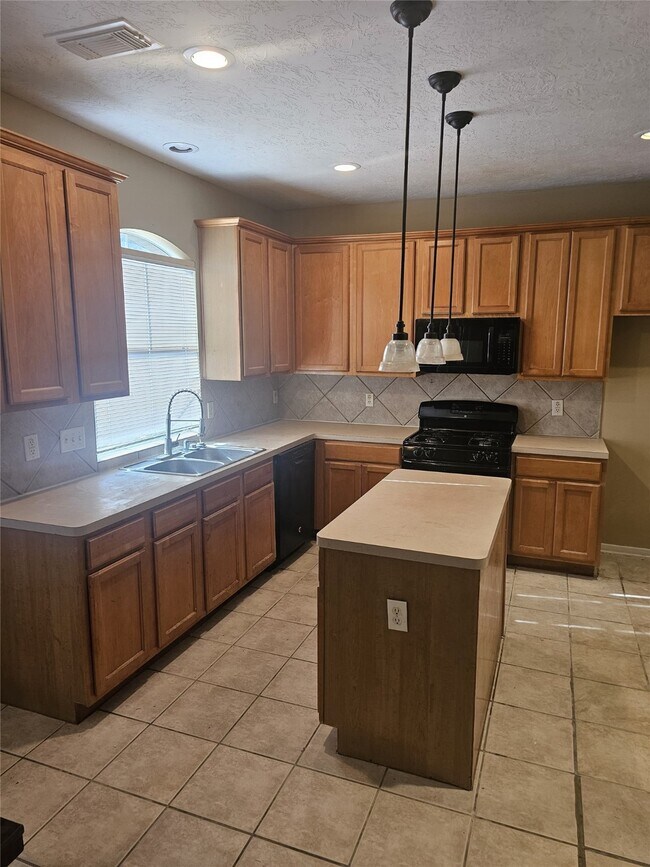 Foto del edificio - 12111 N Brenton Knoll Dr