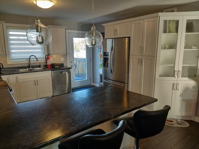 Photo du bâtiment - 166 Cougar Crescent