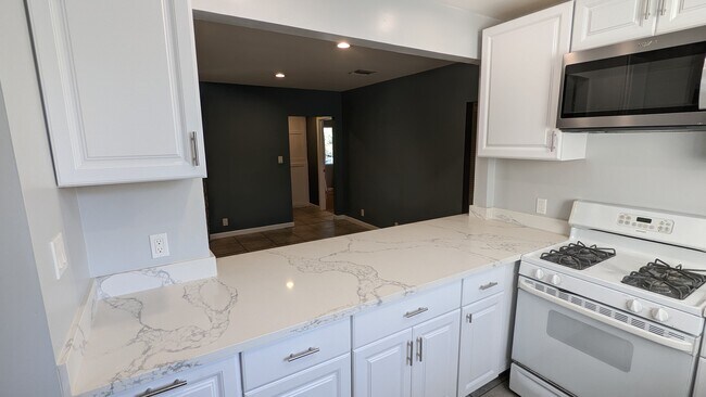 Open to Living Room W/ Bar Seating - 2003 N Summit Ave
