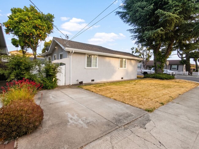 Building Photo - Corner Lot Beauty with Dual Driveways and Upgrades in San Leandro