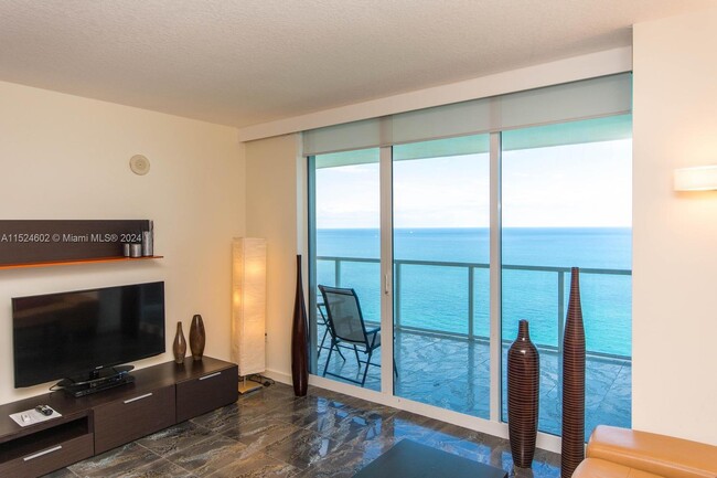 Building Photo - 16699 Collins Ave