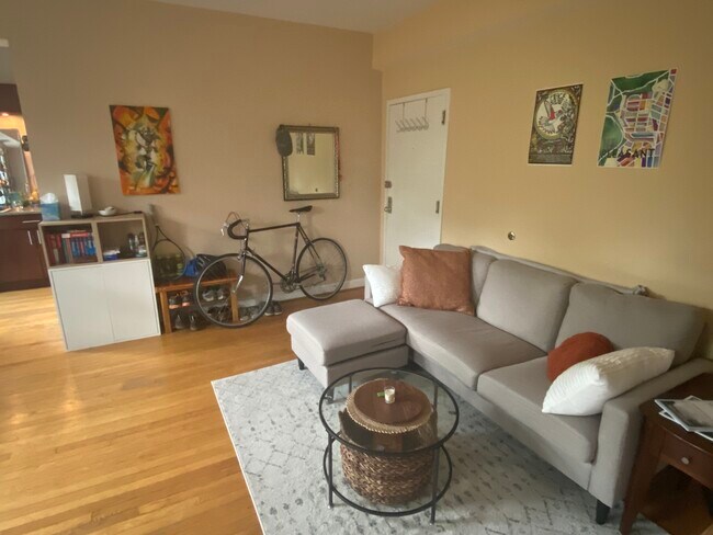 Living room with view of apartment entrance - 1615 Kenyon Street Northwest