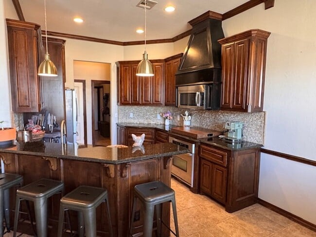 Building Photo - 3 bed plus office , 3 car garage with storm shelter, shop with electric and covered patio in Moor...